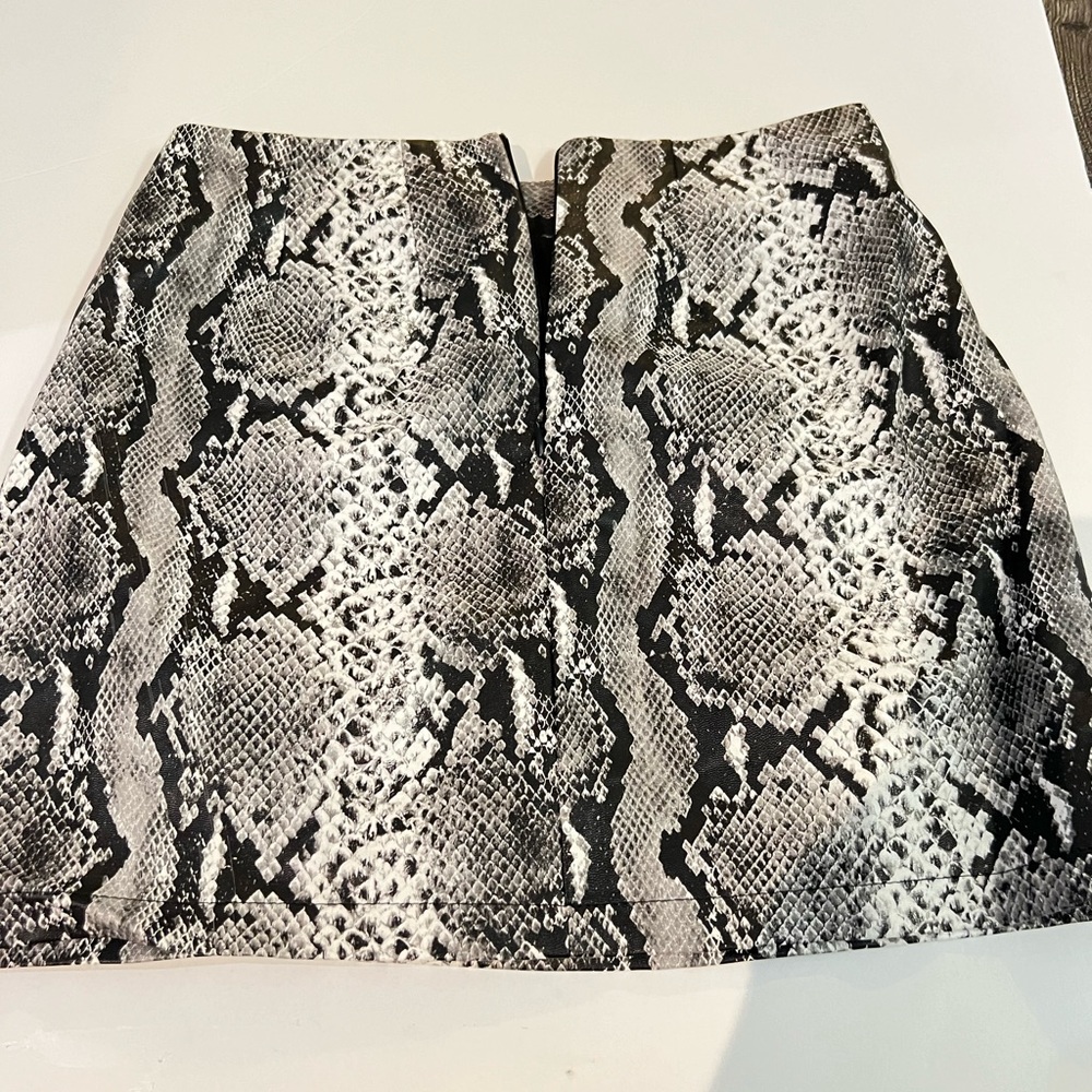 Like new vegan leather cobra print lined skirt